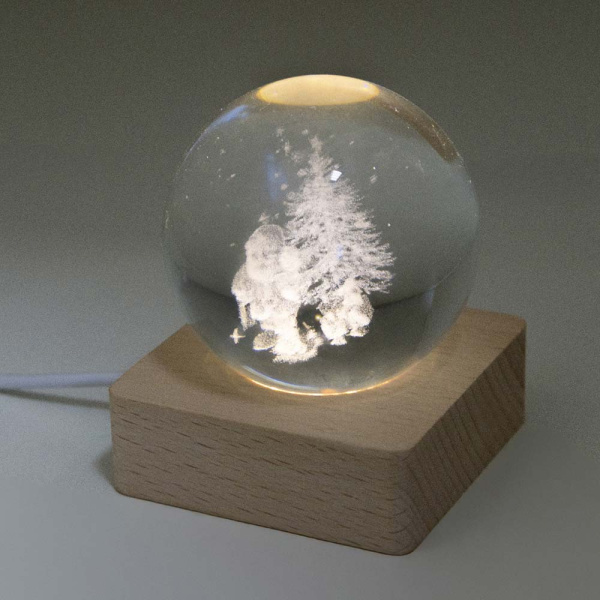 Palla natalizia in vetro con base in legno e luce LED