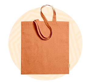 Tote bag classica di cotone organico in colore arancione. Background composto da un cerchio arancione.