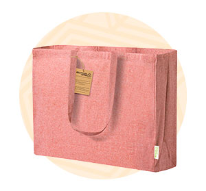 Shopper grande di cotone organico rossa. Background composto da un cerchio arancione. 